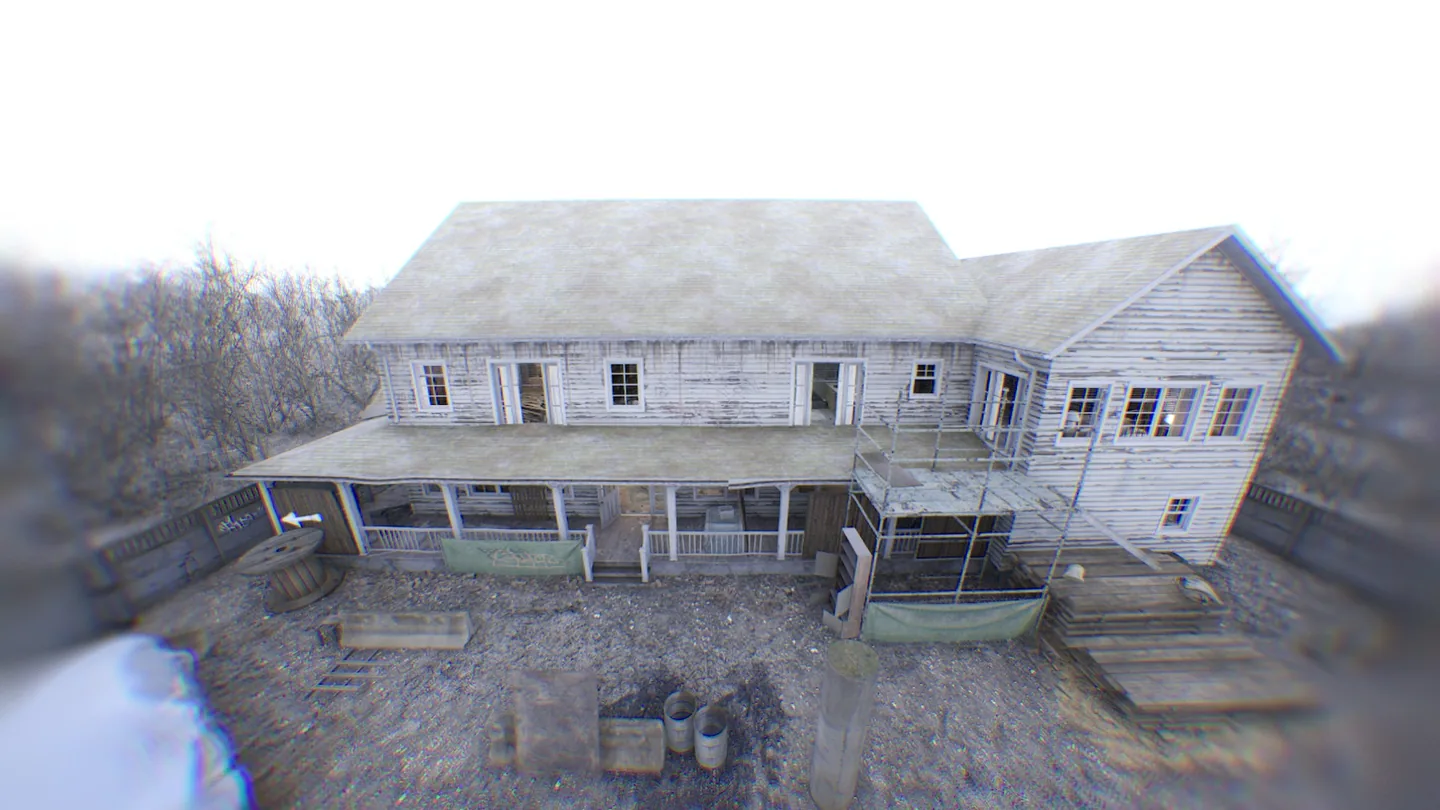 The front porch and damaged exterior of Worn House.